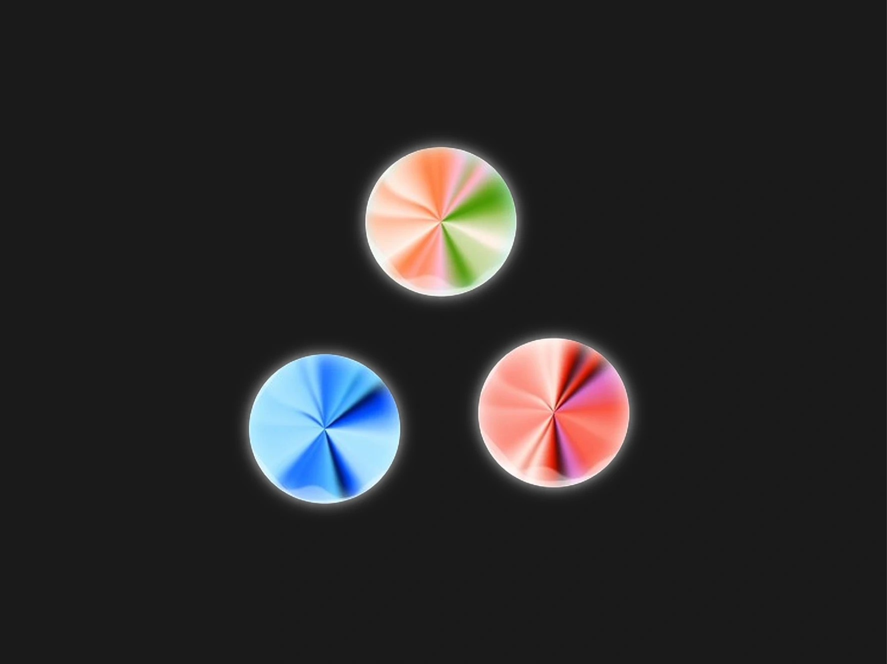 Three glowing, multicolored circular shapes on a black background.