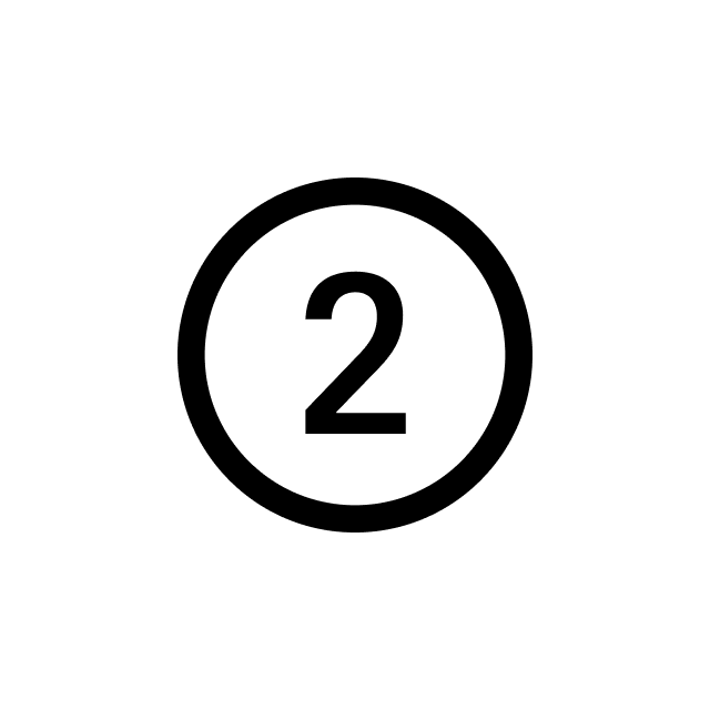 A black silhouette of a person sitting at a desk with a computer, surrounded by books and papers.