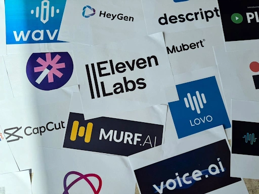Collection of various company and product logos on a wall or surface.